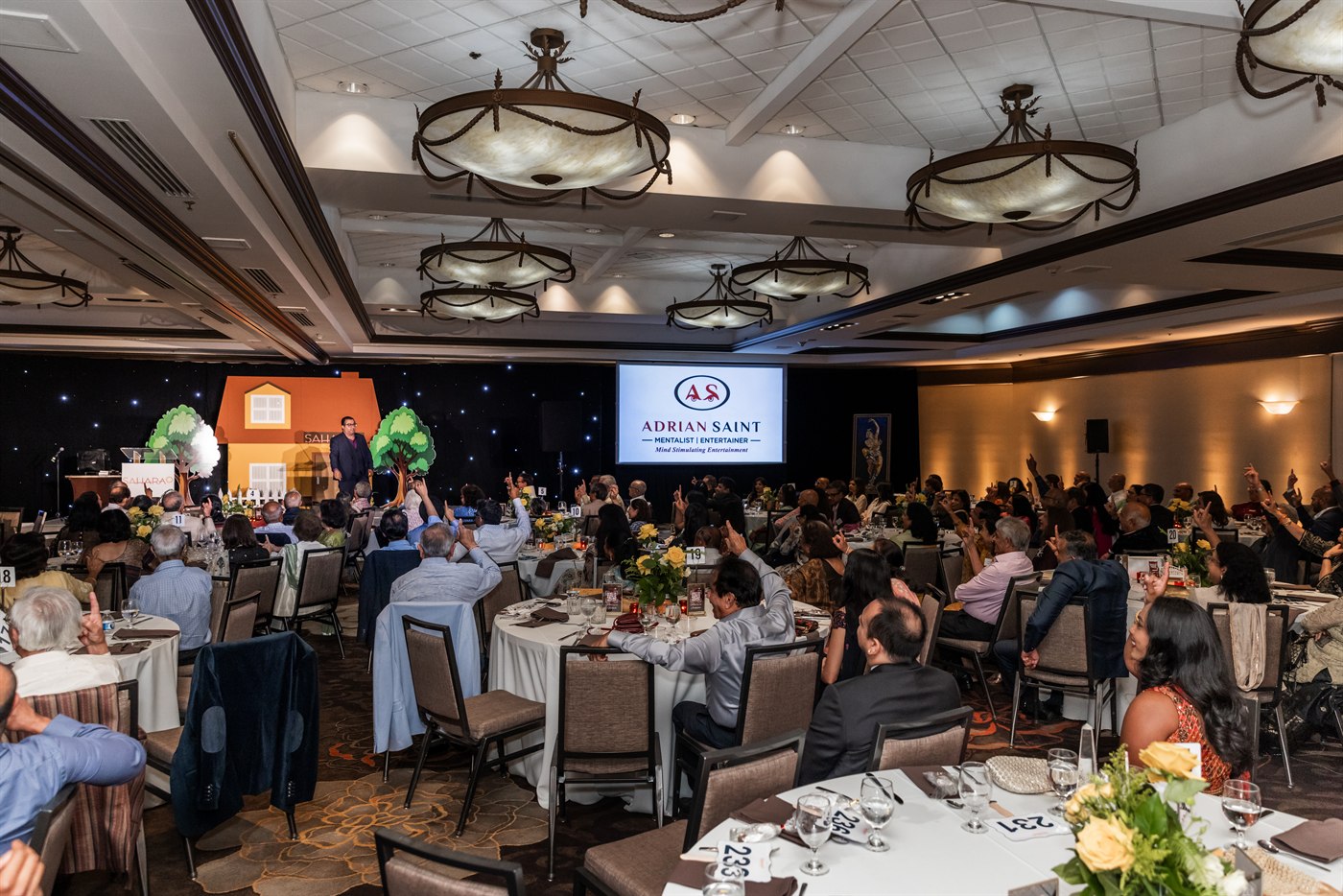 Adrian Saint performing live at national corporate summit and leadership gala
